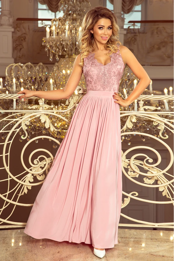 A long, elegant pink gown with a fitted lace bodice and flowing skirt, perfect for formal occasions. The dress features intricate detailing on the top and a soft, graceful drape.