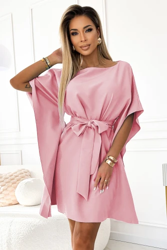 A stylish pink dress with a loose fit and wide sleeves, featuring a matching belt that accentuates the waist. The dress exudes elegance and is perfect for both casual and formal occasions.}