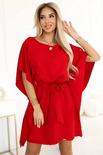 A vibrant red dress with a flowing, butterfly sleeve design and a matching waist tie creates an elegant silhouette. The fabric drapes gracefully, offering a chic and sophisticated look perfect for various occasions.}