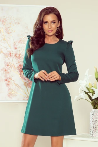 A stylish, dark green trapeze dress with long sleeves and subtle ruffle details on the shoulders. The dress exudes elegance and is perfect for both casual and formal occasions.}