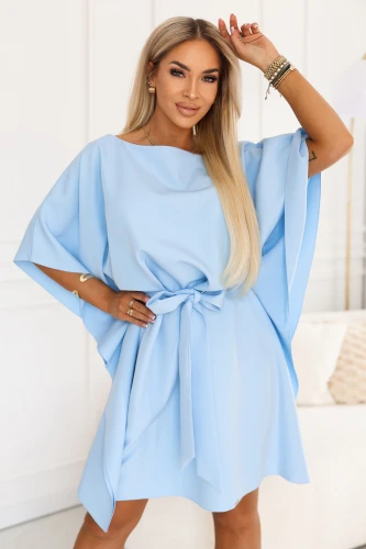 Light blue Numoco dress with wide sleeves and a tie waist.}