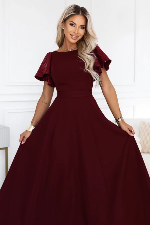 Burgundy long evening dress Mirella Numoco with sequin sleeves, a flared hem and an accentuated waist