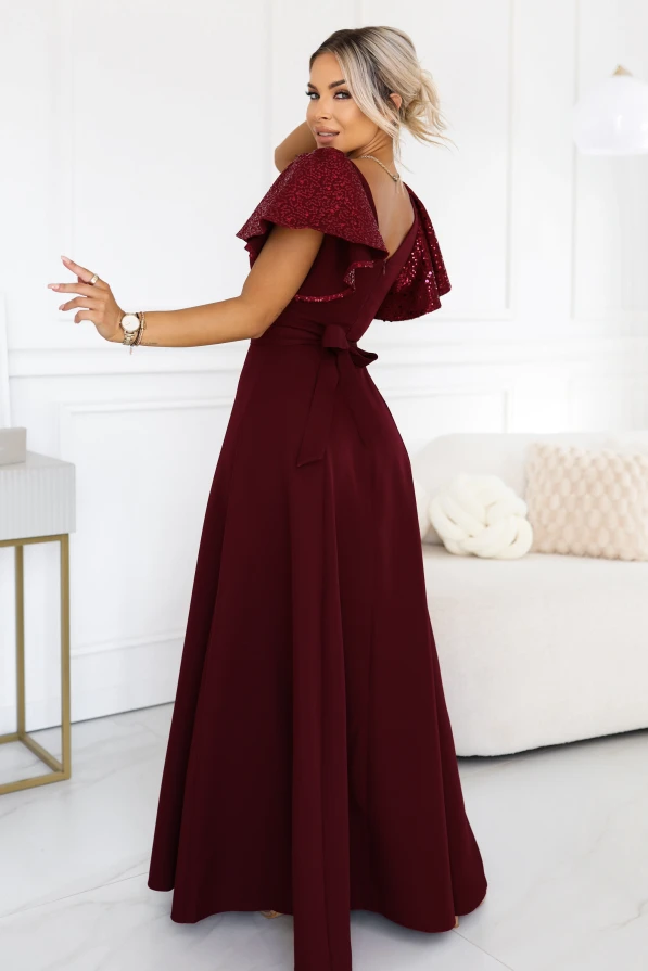 Burgundy long evening dress Mirella Numoco with sequin sleeves, a flared hem and an accentuated waist