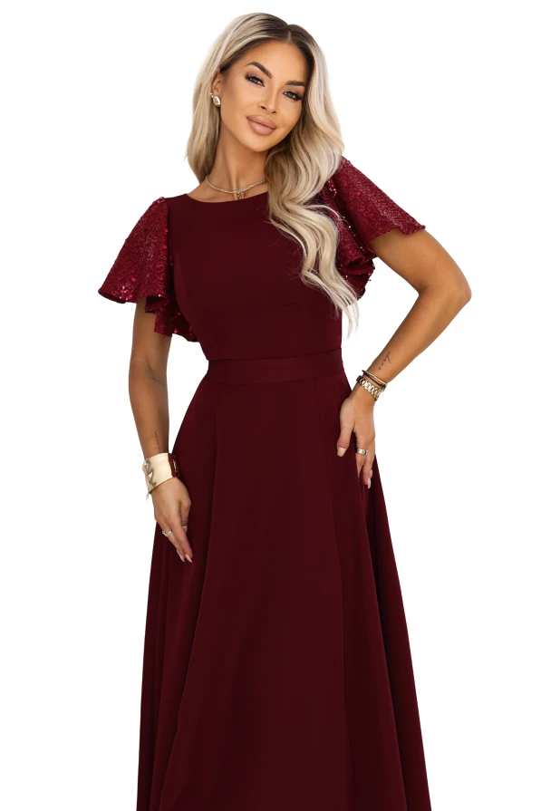 Burgundy long evening dress Mirella Numoco with sequin sleeves, a flared hem and an accentuated waist