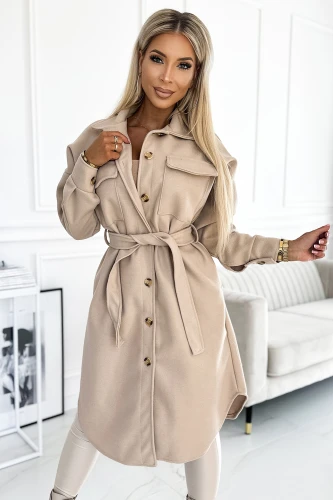 A stylish beige coat with a button-up front and a matching belt, featuring large pockets for added functionality. The coat\'s elegant design is complemented by its warm fabric, making it perfect for cooler weather.}