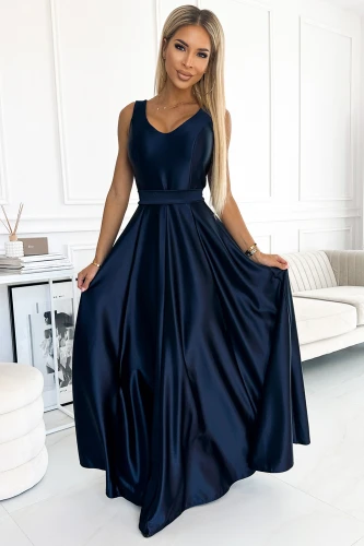 A long, elegant satin dress in a deep navy blue color with a fitted bodice and a flowing skirt. The dress features a sleeveless design and a subtle sheen, perfect for formal occasions.}