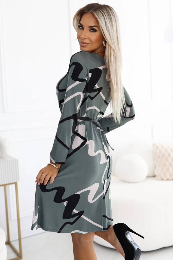 A-line sweater dress with a belt - olive with a black and beige pattern