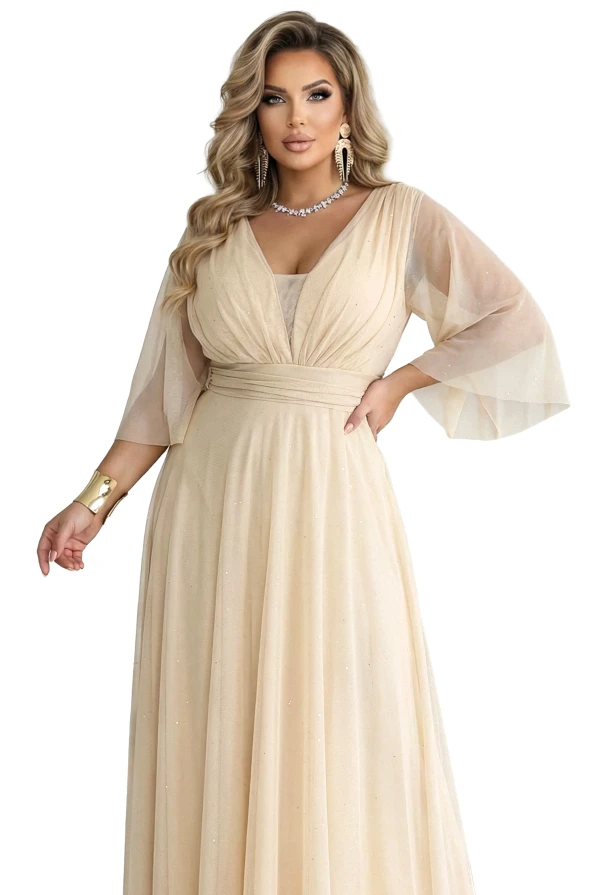 Numoco Basic plus size maxi dress in champagne beige with glitter, envelope V-neck and sheer sleeves, wedding styling.